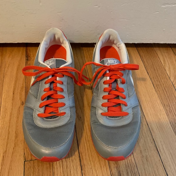 Nike Shoes - retro nike womens size 11 silver/orange